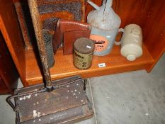 A vintage carpet sweeper, parafin can etc.