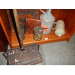 A vintage carpet sweeper, parafin can etc.