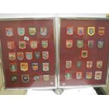 38 cloth badges in two frames, glazed.