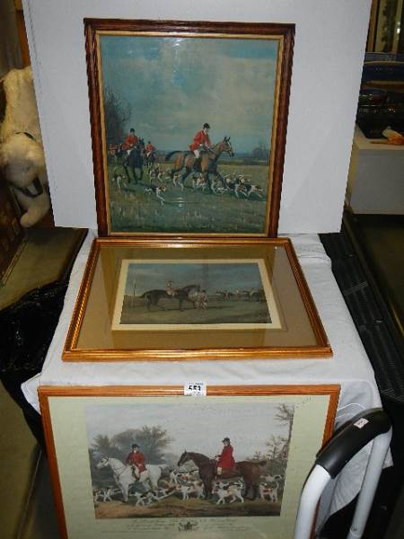 Three framed and glazed hunting scenes.