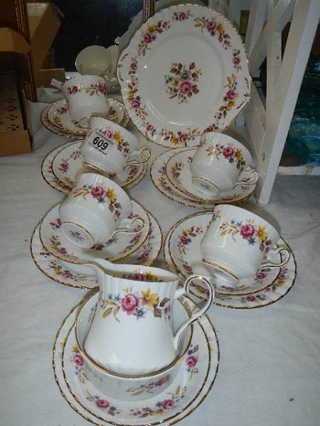 A Royal Stafford bone china tea set (missing one teacup).