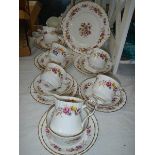 A Royal Stafford bone china tea set (missing one teacup).