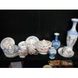 A mixed lot of oriental ceramics including plates, vases etc.