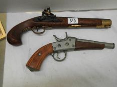 Two ornamental pistols.