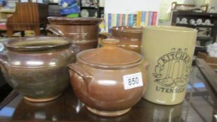 A quantity of stoneware pots.