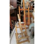 Two artist's easels.