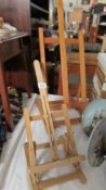 Two artist's easels.