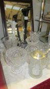 A mixed lot of cut glass vases, tall coloured spill vase etc.