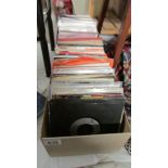 Two boxes of 45 rpm records (some missing sleeves).