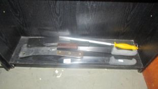 A quantity of chef's/butchers knives.