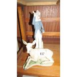 A Casades figure of a clown and a Lladro style deer, both made in Spain.