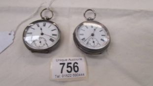 Two silver pocket watches.