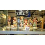 Six vintage Goebel figures including Little Fiddler, Shepherd Boy etc.