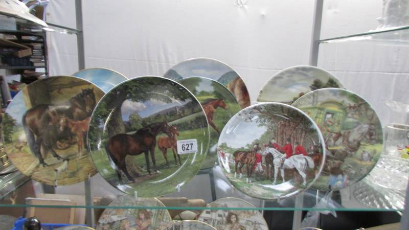 Six horse related collector's plates and two others.