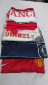 Two Manchester United shirts - Medium 'Rooney', Small 'Beckham,