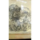 A framed and glazed drawing of two spaniel puppies signed J Hagley 1943.