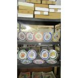 Fifteen collector's plates including Royal Albert RHS Chelsea flower show, all boxed.