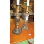 A pair of Victorian Diamond Princess brass candlesticks.