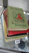 Four children's books including Daily Express Children's Annual, Alice's Adventures in Wonderland,