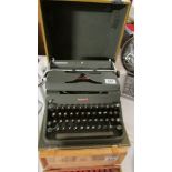 A cased vintage Hermes 2000 typewriter.