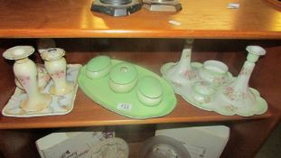 Three china trinket sets.