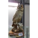 A superb owl sculpture by G Armani.