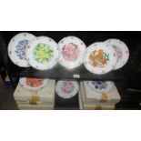 Eight boxed Royal Albert floral collector's plate.