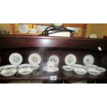 A large lot of Royal Worcester pin dishes and a Royal Worcester coffee can and saucer.