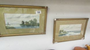 A pair of framed and glazed watercolours signed S Russell.