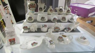 Fifteen pieces of crested china including Edith Cavell, gun boat, cow, fishing creel etc.