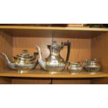 A four piece silver plate tea set.