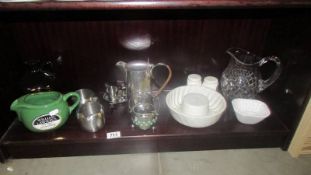 A mixed lot including vintage jelly moulds, china moulds, silver plate,