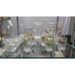 A mixed lot of glass ware including examples decorated with vintage cars.