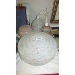 A 1930's fly catcher lamp shade and three others.