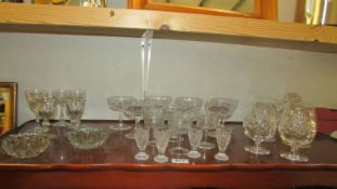 A mixed lot of drinking glasses.