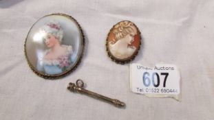 An Edwardian hand painted miniature, a cameo and a propelling pencil.