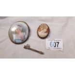 An Edwardian hand painted miniature, a cameo and a propelling pencil.