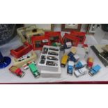 A mixed lot of die cast trade vans, cars etc.