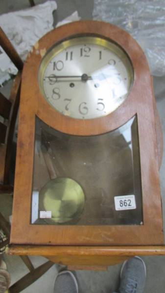 An old 8 day wall clock.
