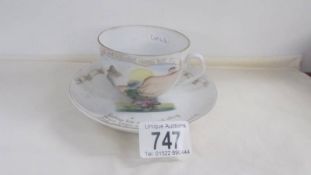 A Child's fine porcelain tea cup and saucer featuring Little Miss Muffett and Jack & Jill.