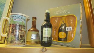 A Bell's whisky bell, a gift pack. pub jug etc.