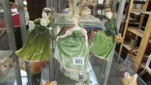 Three Royal Doulton figurines, Michelle HN 2234, Grace HN 2318 and Simone HN 2378.