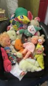 A mixed lot of soft toys and dolls.