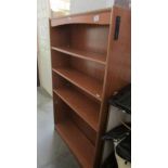 A good quality teak book case.