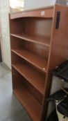 A good quality teak book case.