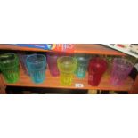 A quantity of vintage multicoloured drinking glasses (10 in total).