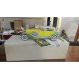 A boxed Franklin Mint model Gary Cooper's Duesenberg J car.
