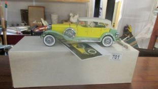 A boxed Franklin Mint model Gary Cooper's Duesenberg J car.