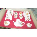 A boxed vintage nursery rhyme child's tea set ( box a/f).