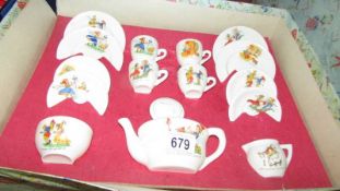 A boxed vintage nursery rhyme child's tea set ( box a/f).